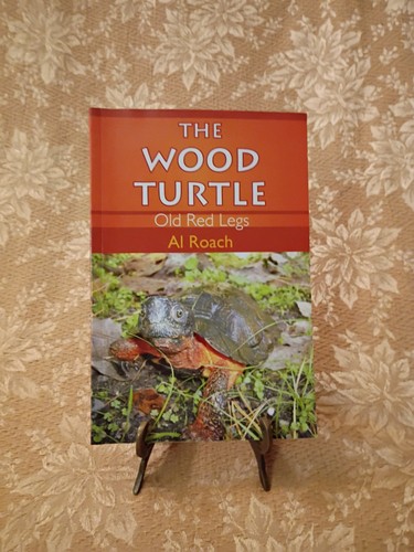 The wood turtle - red, legs